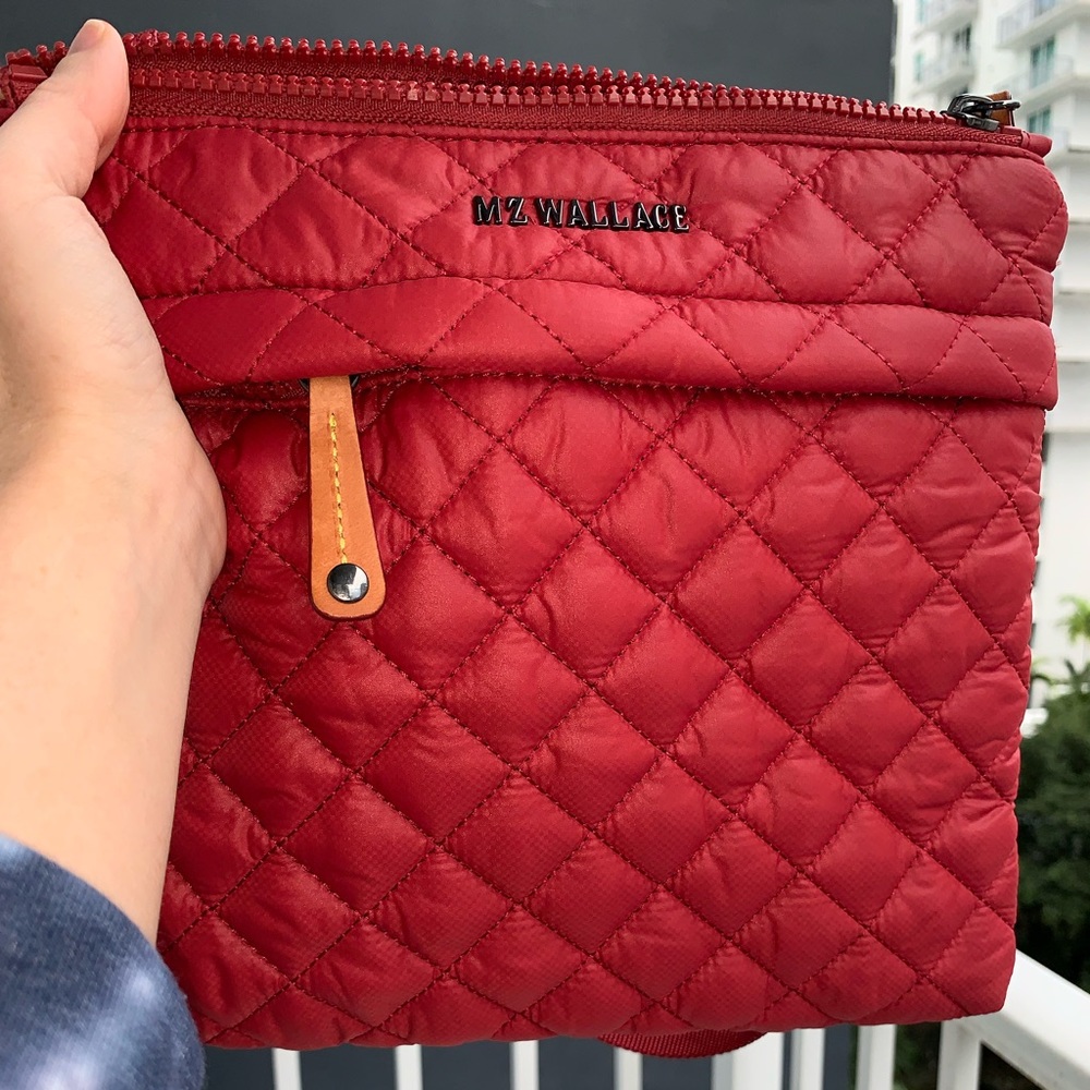 MZ Wallace metro flat crossbody bag in red.